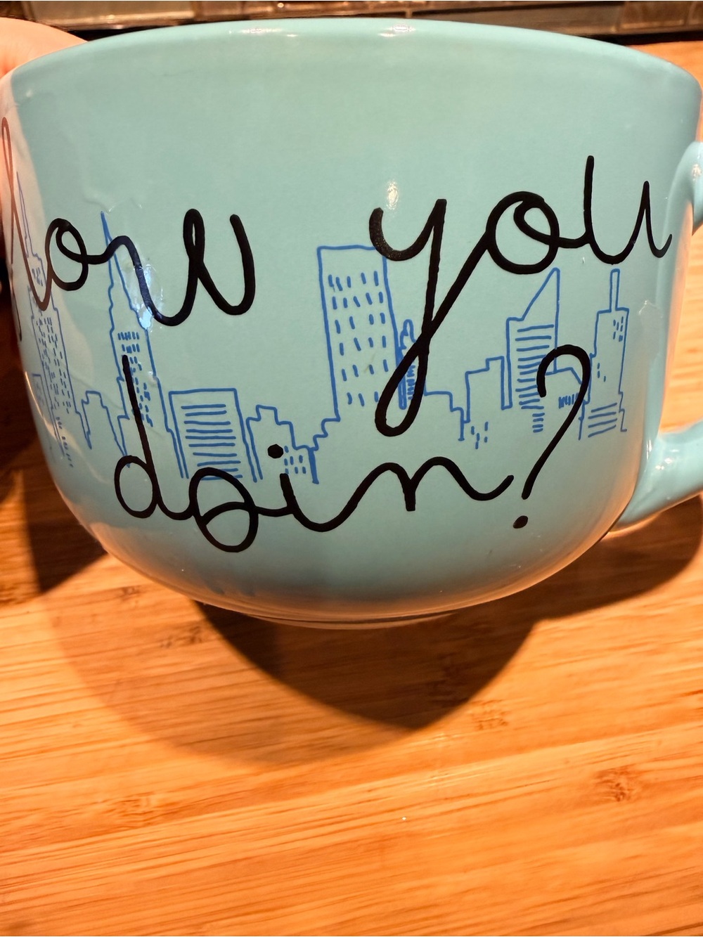 FRIENDS 24oz Aqua Ceramic Mug with Black Script and Blue Skyline